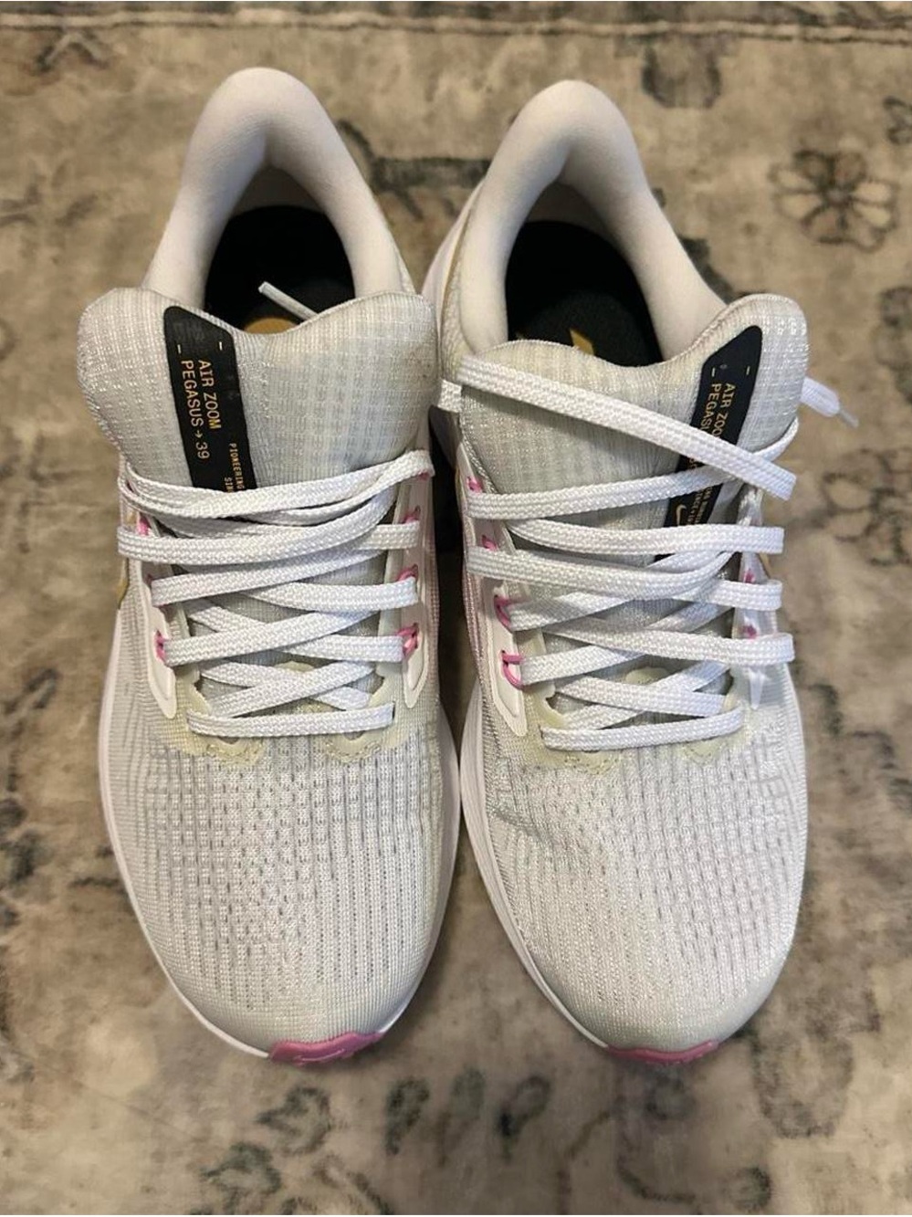 Nike Women’s White Athletic Running Shoes with Pink Accents